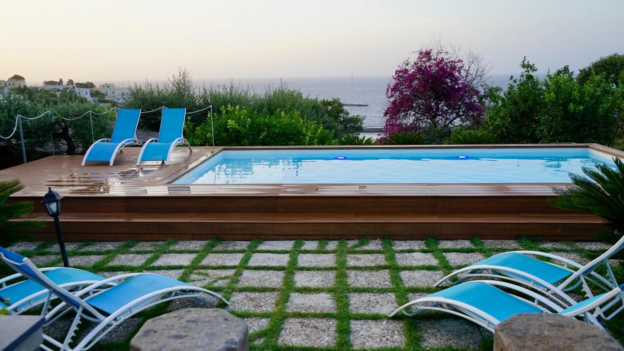 Amalu Piscina E Giardino